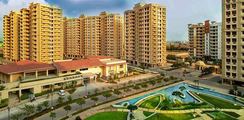 Inviting image of Ashiana Anmol, showcasing the charm of the residential community with its modern architecture, lush landscaping, and a warm, welcoming ambiance.